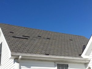 These shingles were not installed properly, allowing them to blow off easily.